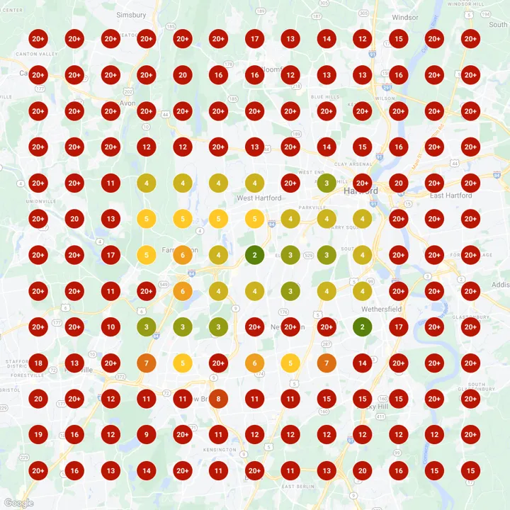 Grid scan for “retirement advising” at 3:39 PM. Most of the 169 pins are red, with a small cluster of better ranks near the Fuchs Financial office.